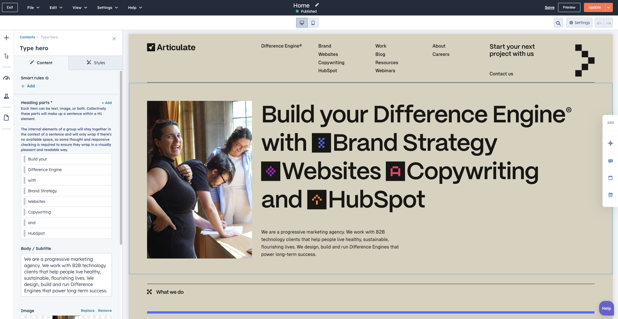 A screenshot of the Articulate Marketing homepage as seen in the HubSpot editor view. The background is a beige colour, with a large, bold headline that says 'Build your Difference Engine with Brand Strategy, Websites, Copywriting and HubSpot. There is an image of Articulate employees working together with one person smiling to the camera.